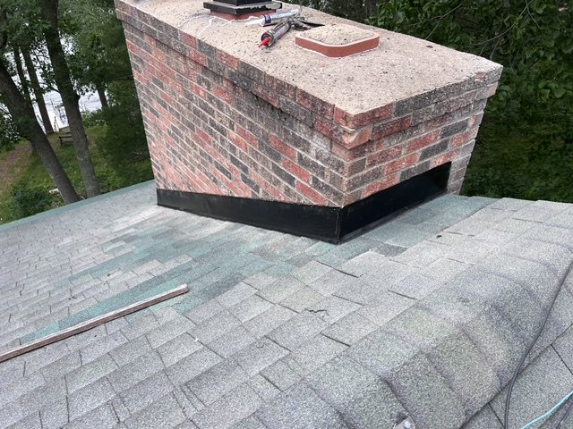 Pine River chimney roof repair job after picture