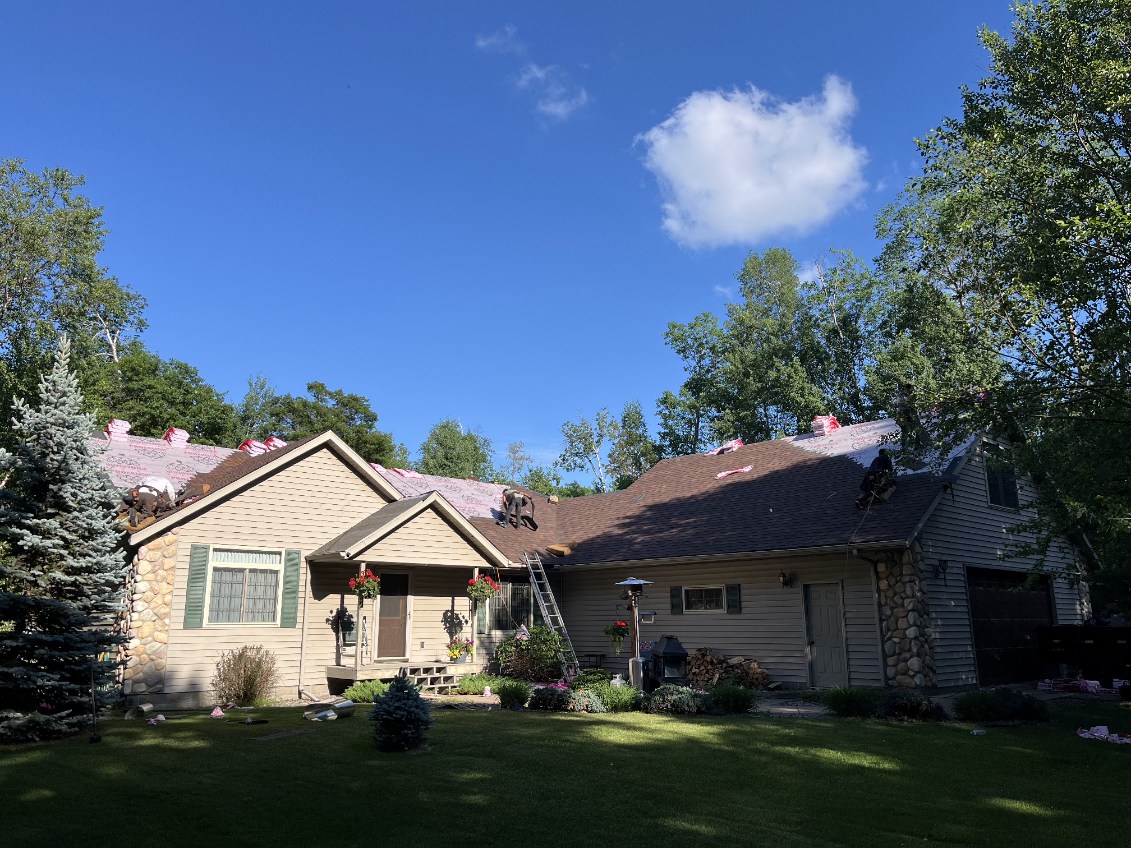 Revival Roofing team working on Baxter MN roof project