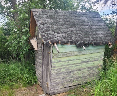 Minnesota roof repair for shed before picture