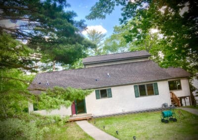 residential asphalt roof replacement completed with brown architectural shingles