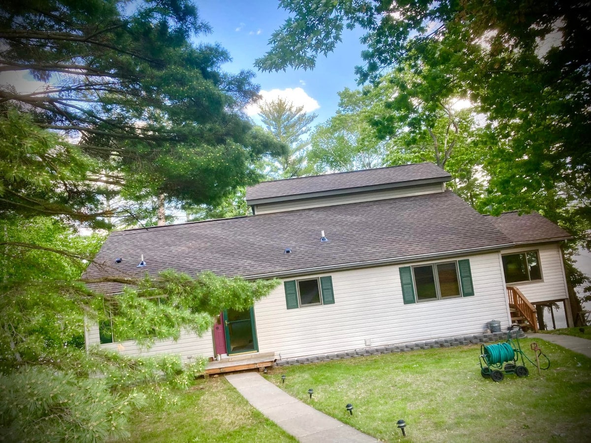 residential asphalt roof replacement completed with brown architectural shingles