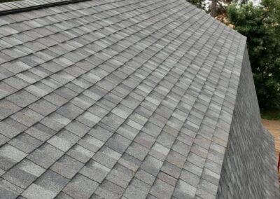 Asphalt roof replacement completed with gray architectural shingles