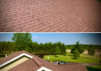 Residential roof completed with red architectural asphalt shingles