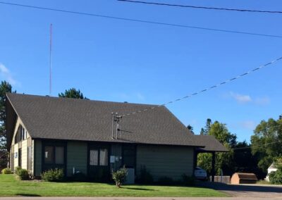 Asphalt roofing job completed for business in Pine River MN side view