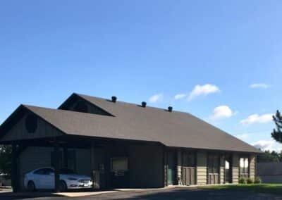 Asphalt roofing job completed for business in Pine River MN front view