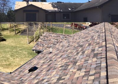 Roof replacement before and after photos of multi brown colored architectural shingles