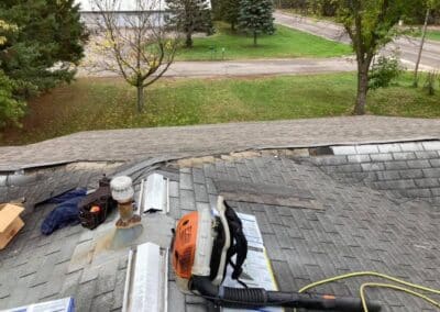 Architectural asphalt shingles roof replacement work in progress
