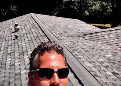 Robert Aguirre working on residential roof