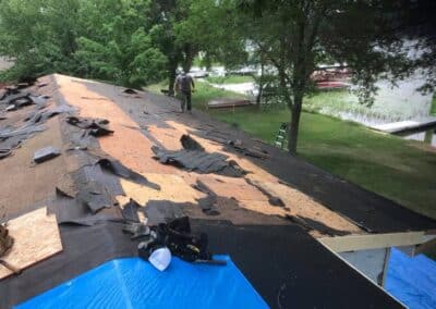 roof replacement decking and tearing off underlayment before installing new shingles