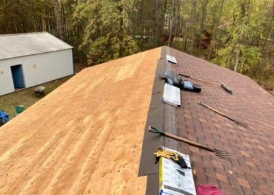 roof replacement decking shown in photo before installing shingles