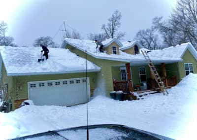 Roof snow removal in Brainerd Lakes area