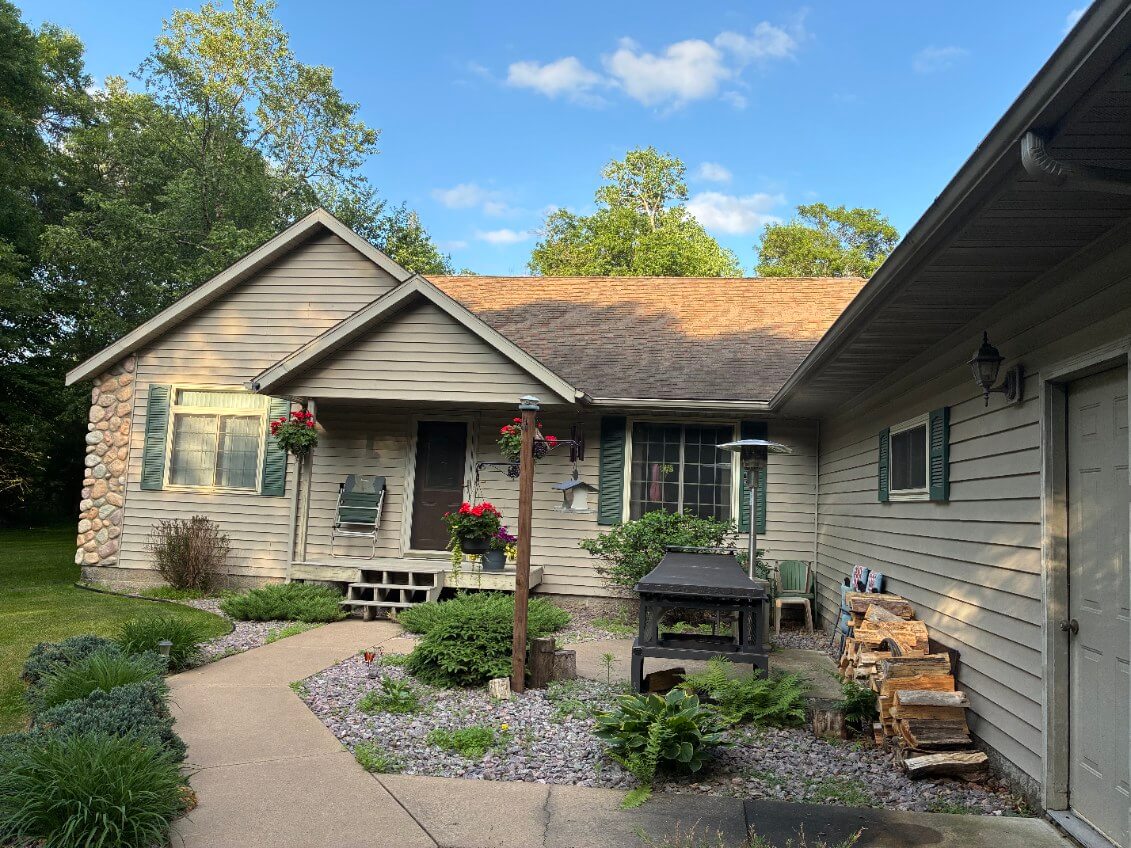 Asphalt roof replacement project before work completed in Baxter MN
