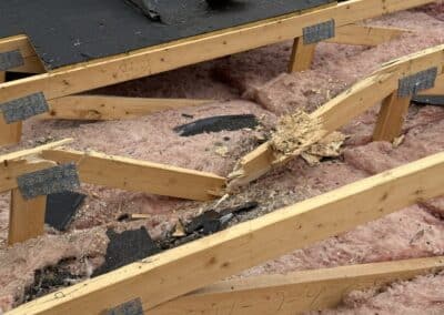 Asphalt roof replacement in progress showing decking that needs to be replaced in Lakeshore MN